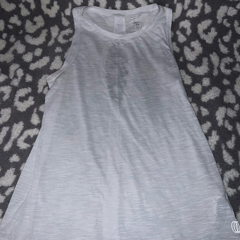 white workout top with open back